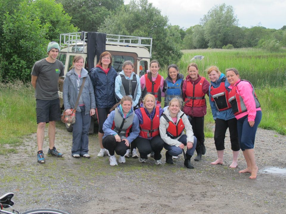 group of happy tourists after SUP adventure